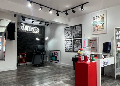 Chic interior of Concepts Tattoo Limited in Swindon, England, GB with stylish decor and art displays.