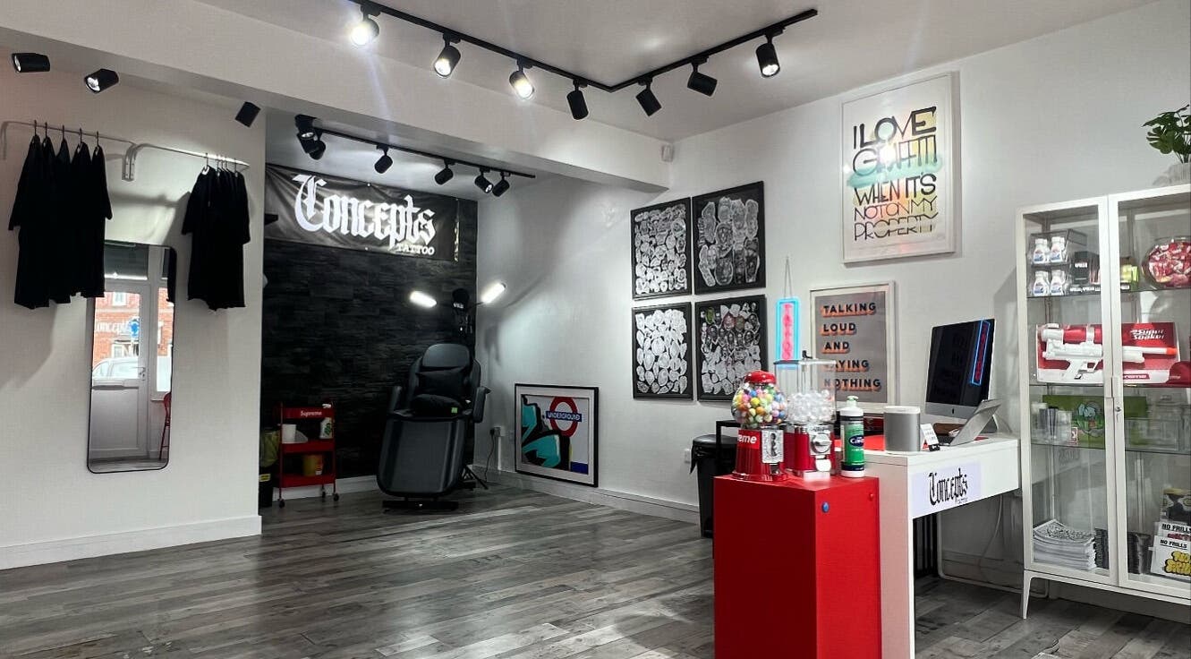 Chic interior of Concepts Tattoo Limited in Swindon, England, GB with stylish decor and art displays.