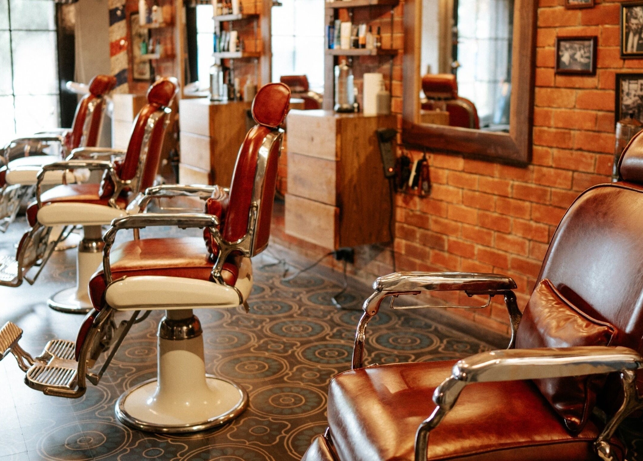 Vintage barber chairs at Goodfellas Barber & Brand | Est. 2018, Vagator, Goa, IN with a classic decor.