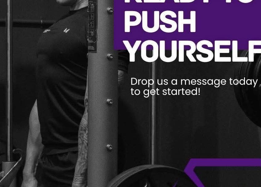 Person working out at Synergy Fitness Hub, Amlwch, Wales, GB. Text reads 'Ready to push yourself?'