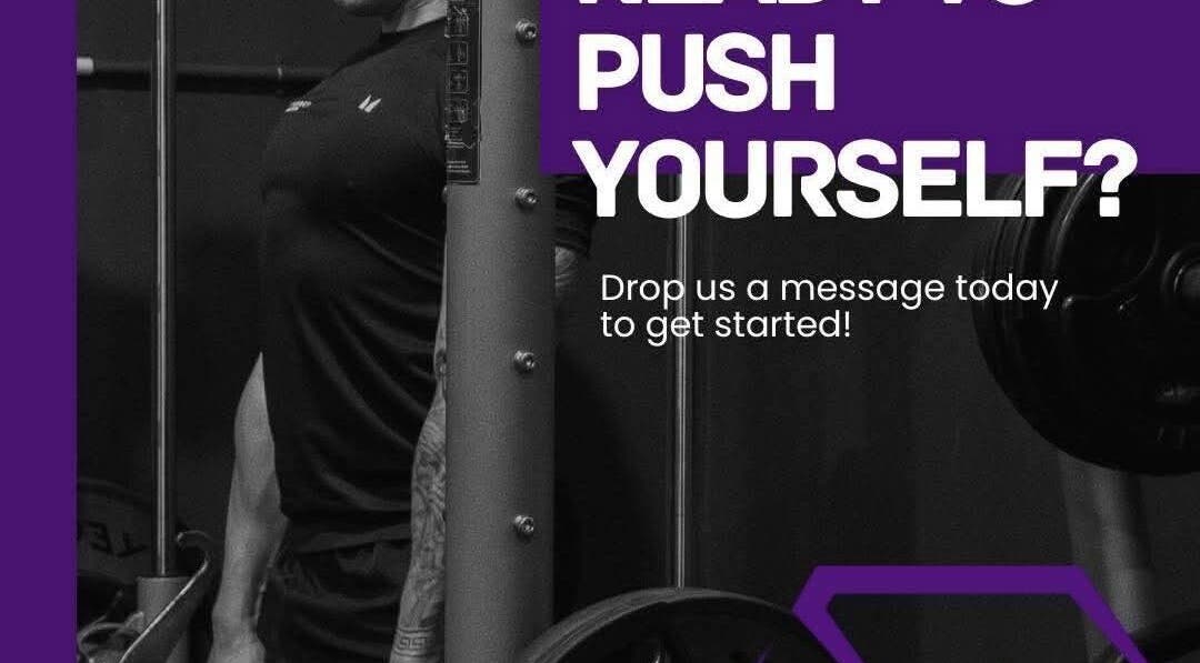 Person working out at Synergy Fitness Hub, Amlwch, Wales, GB. Text reads 'Ready to push yourself?'