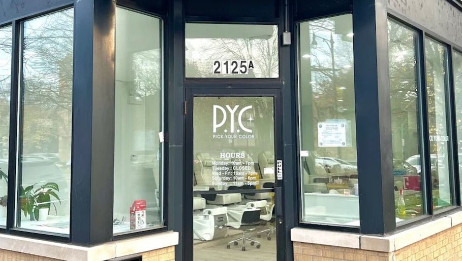 Street view of Pick Your Color Nail Salon entrance in Chicago, IL, with modern glass doors and inviting decor.
