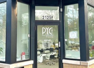Street view of Pick Your Color Nail Salon entrance in Chicago, IL, with modern glass doors and inviting decor.