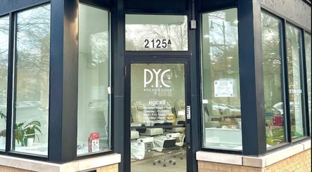 Street view of Pick Your Color Nail Salon entrance in Chicago, IL, with modern glass doors and inviting decor.