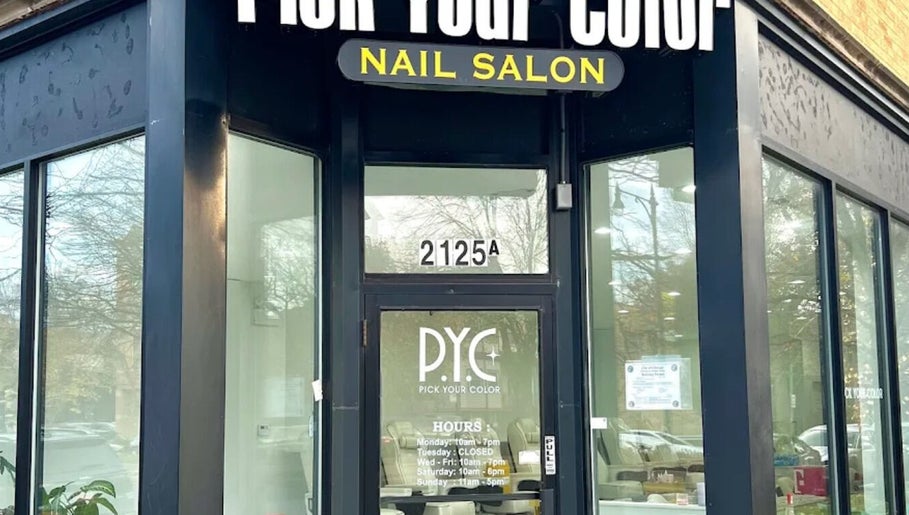 Entrance of Pick Your Color Nail Salon in Chicago, IL, US with glass doors and signage.