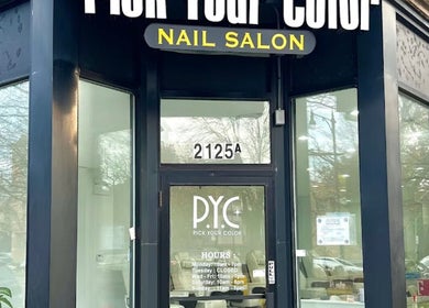 Entrance of Pick Your Color Nail Salon in Chicago, IL, US with glass doors and signage.