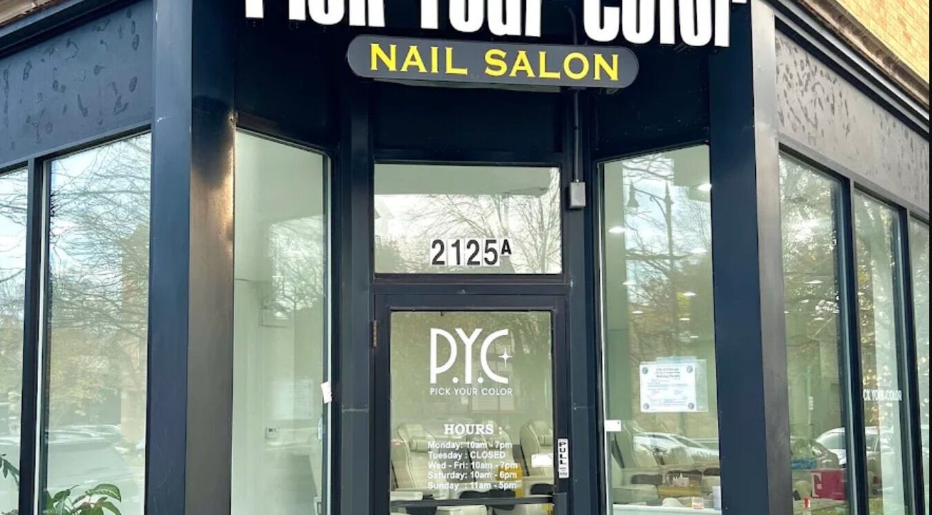 Entrance of Pick Your Color Nail Salon in Chicago, IL, US with glass doors and signage.