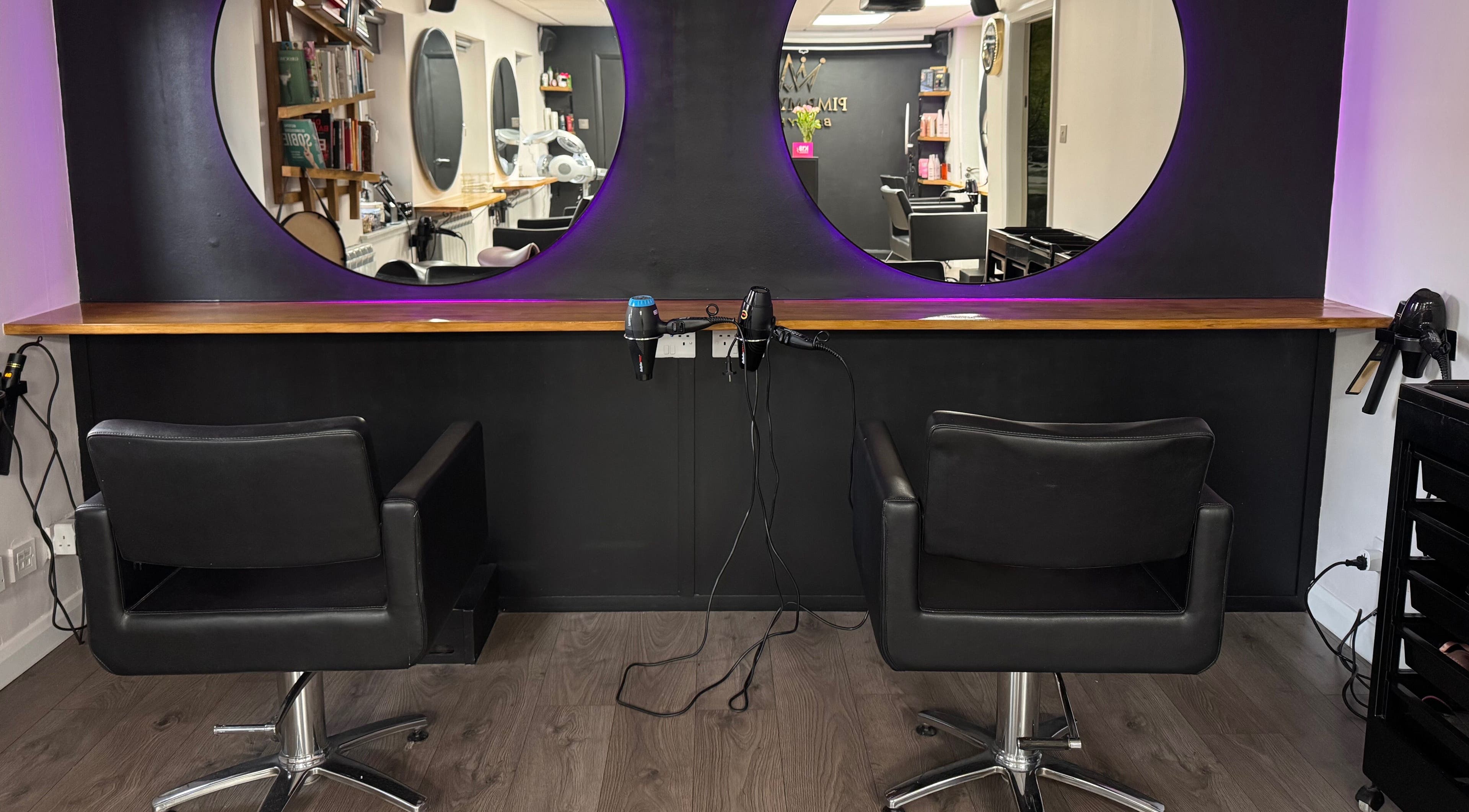 Modern salon chairs and elegant mirrors at Pimp My Hair, Aberdeen, Scotland, GB.