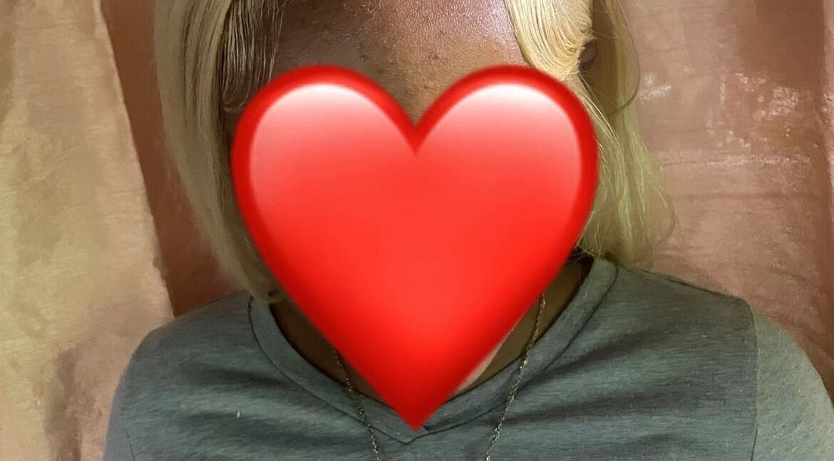 Blonde hairstyle showcased at Glam and Vibe Studio, Mahaica, Demerara-mahaica, GY with elegant curtain backdrop.