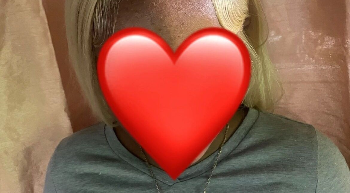 Blonde hairstyle showcased at Glam and Vibe Studio, Mahaica, Demerara-mahaica, GY with elegant curtain backdrop.