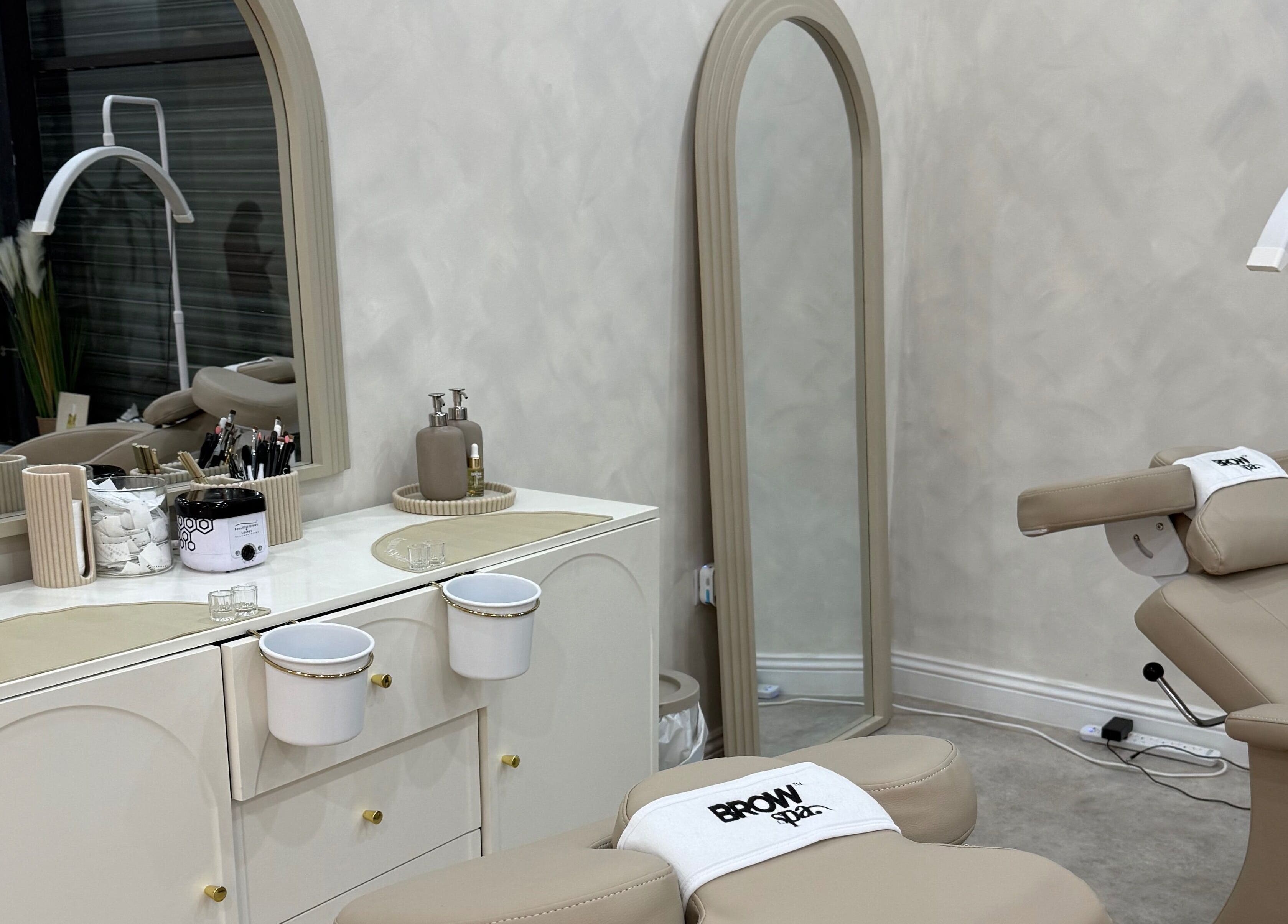 Modern beauty treatment room at Louise Butler Beauty, Kidsgrove, England, GB featuring elegant decor and styling.