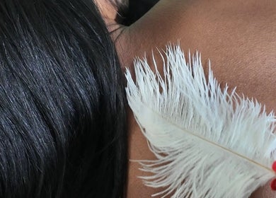 Relaxing feather massage at Sound, Mind and Bowl, Sidcup, England, GB, enhancing well-being through gentle touch.