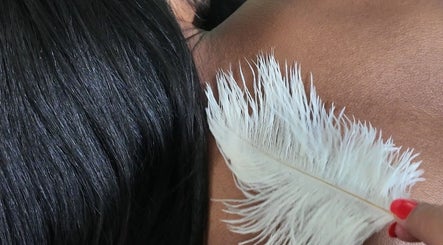 Relaxing feather massage at Sound, Mind and Bowl, Sidcup, England, GB, enhancing well-being through gentle touch.