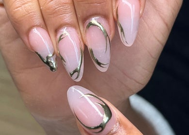 Stylish nail art with gold accents at Clawed By Chey in Breda, Noord-brabant, NL.