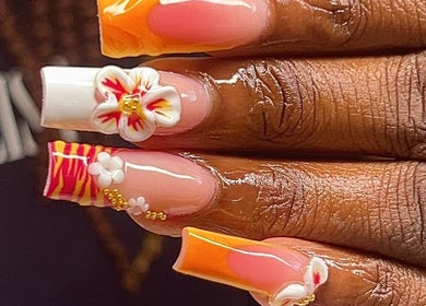 Vibrant floral nail art at Clawed By Chey in Breda, Noord-brabant, NL, showcasing detailed design.