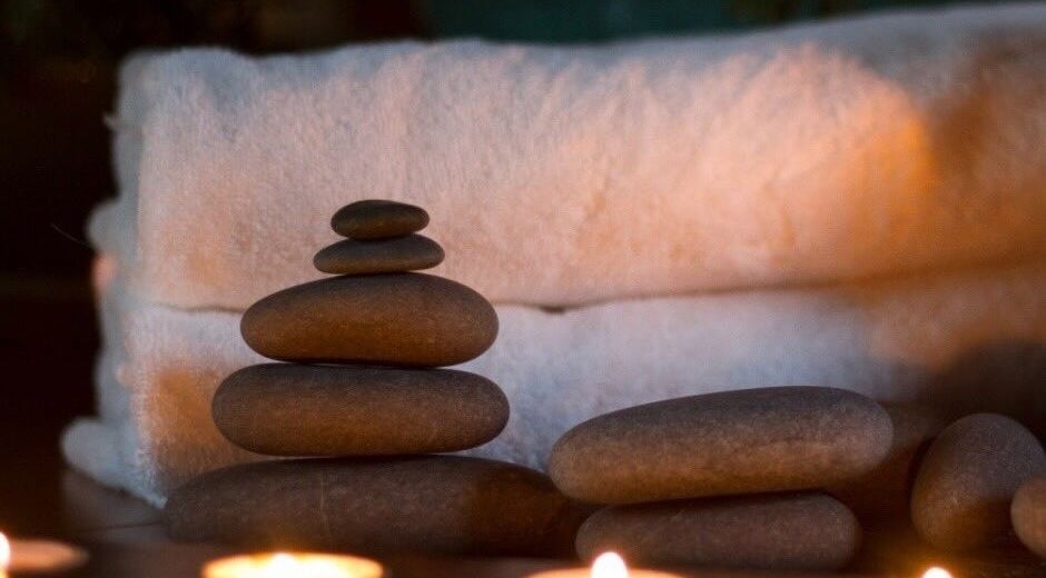 Elegant Touch Massage in Hughson, California offers soothing stone therapy for ultimate relaxation.