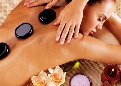 Hot stone massage at Elegant Touch Massage in Hughson, California, US offers relaxation and rejuvenation.