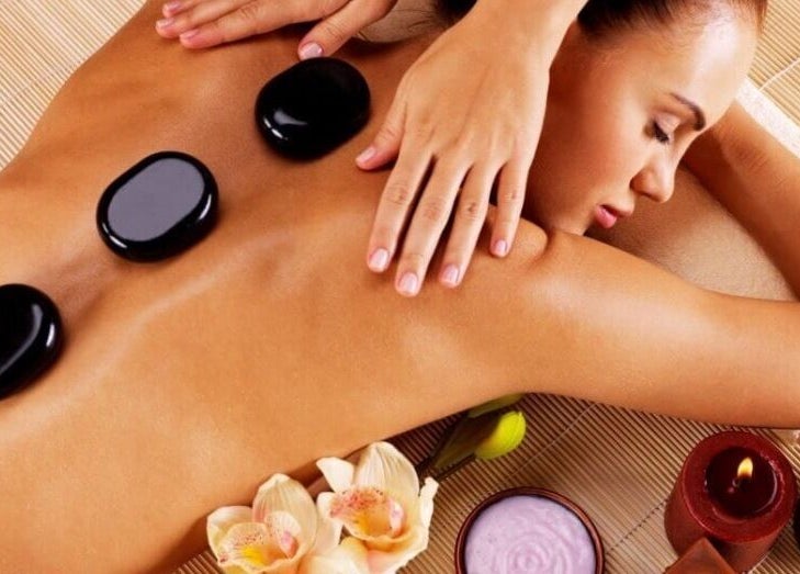 Hot stone massage at Elegant Touch Massage in Hughson, California, US offers relaxation and rejuvenation.