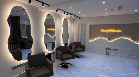 Modern salon interior at House Of Kharchier Beauty Salon - Birmingham, showcasing stylish mirrors in Birmingham, England, GB.