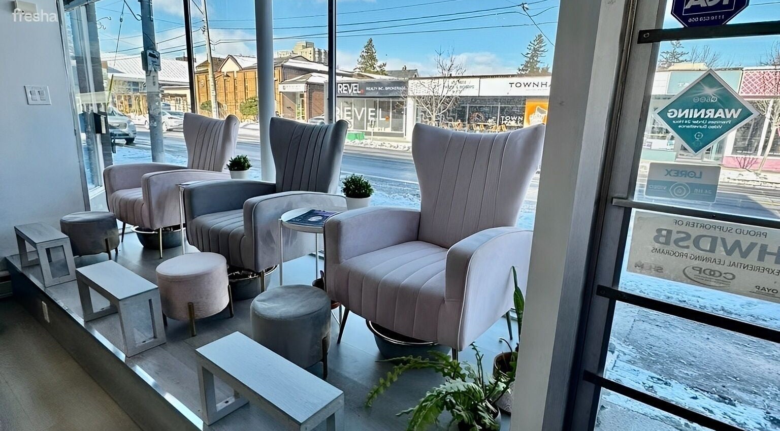 Elegant lounge chairs at Elodia Beauty&Spa in Hamilton, Ontario, CA offering a relaxing spa experience.
