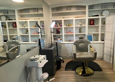 Modern salon chair and shelves at Natural, Locs and Braids, Columbia, South Carolina, US.