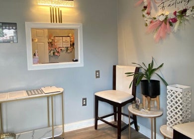 Stylish waiting area at Natural, Locs and Braids in Columbia, South Carolina, US with elegant decor.