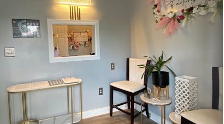 Stylish waiting area at Natural, Locs and Braids in Columbia, South Carolina, US with elegant decor.