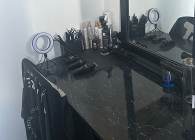 Sleek styling station at Yz Cuts, Markham, Ontario, CA featuring tools and products for a perfect beauty experience.