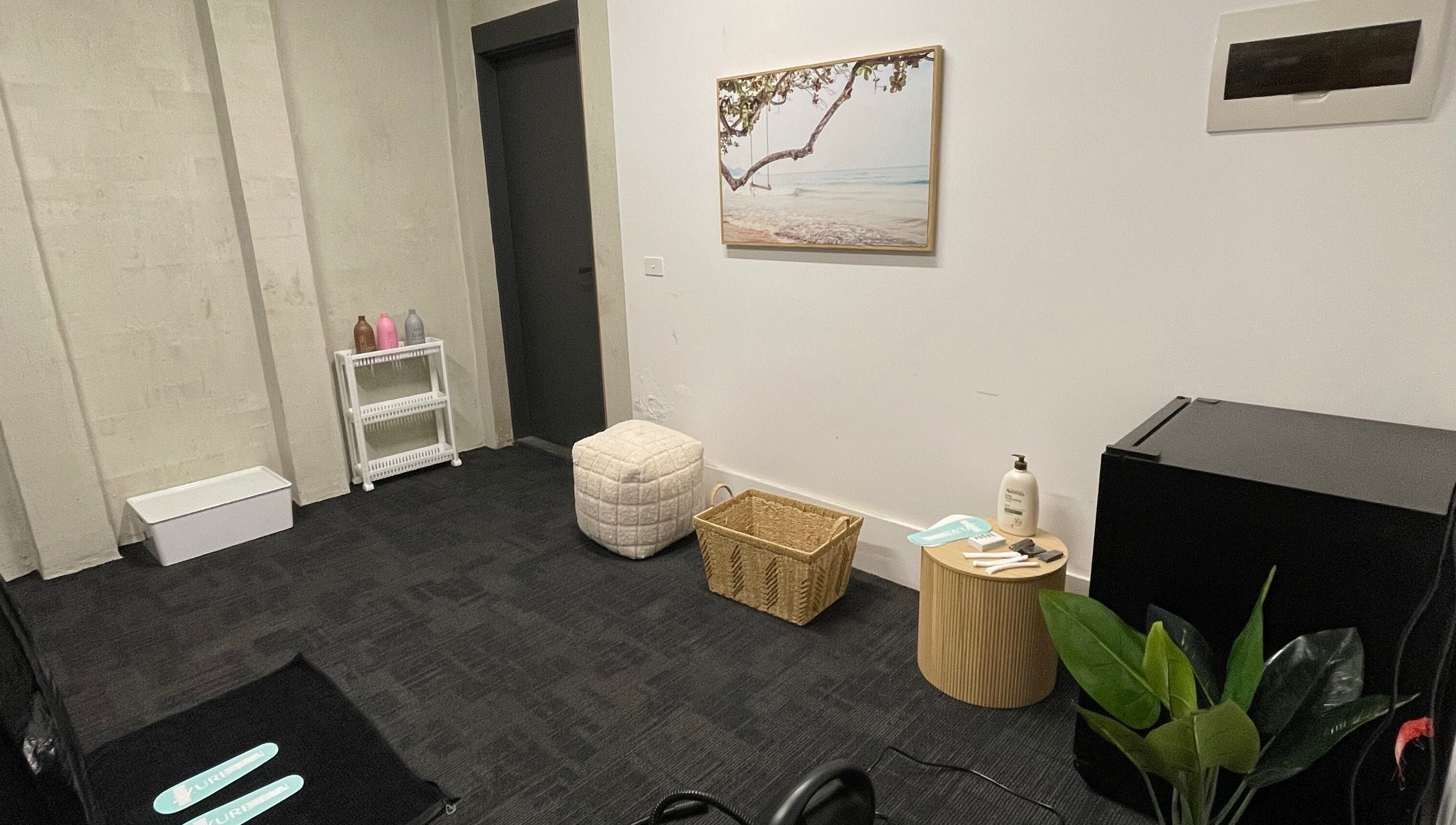 Relaxing room at The Studio, Melbourne, Victoria, AU with seating, decor, and a peaceful ambiance.