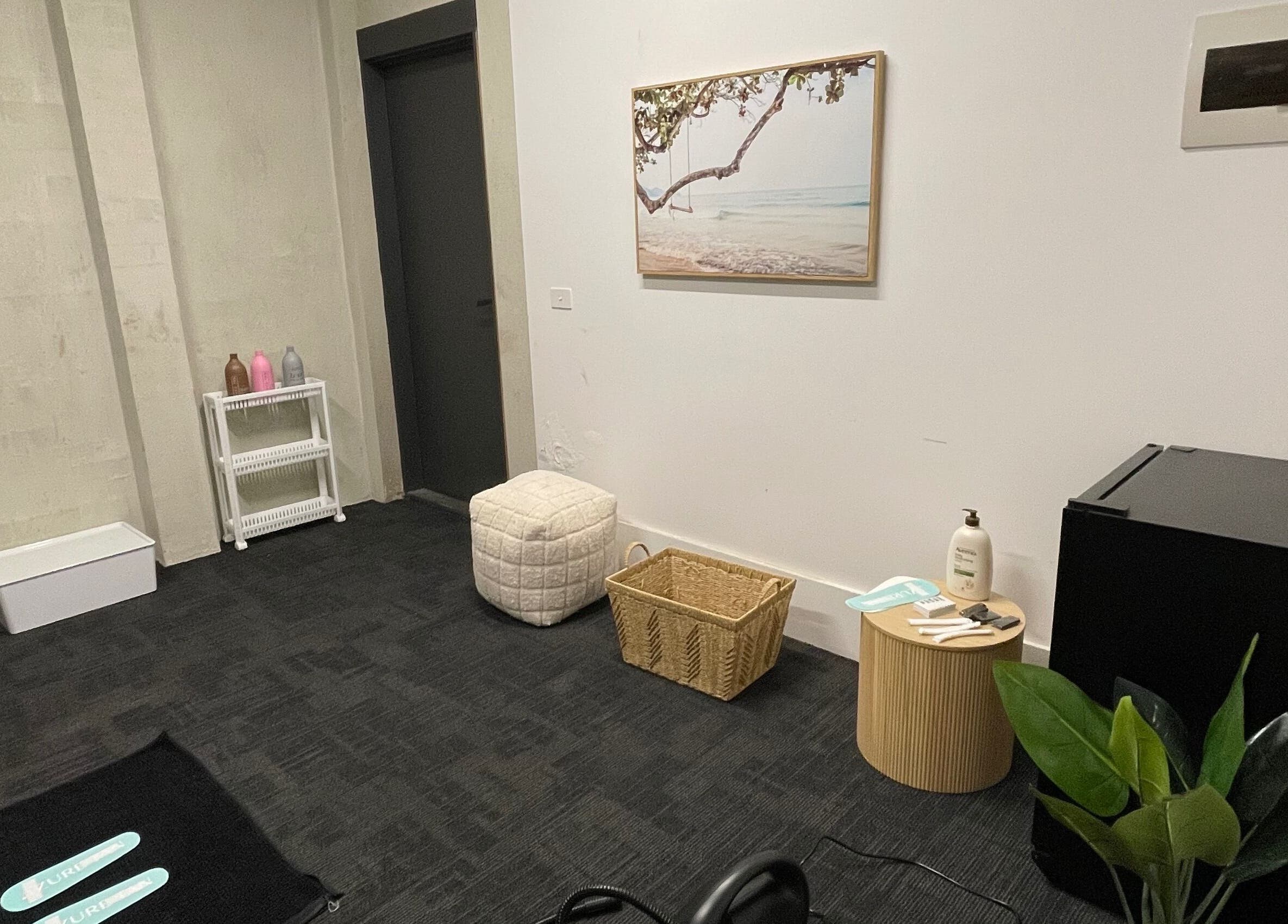 Relaxing room at The Studio, Melbourne, Victoria, AU with seating, decor, and a peaceful ambiance.