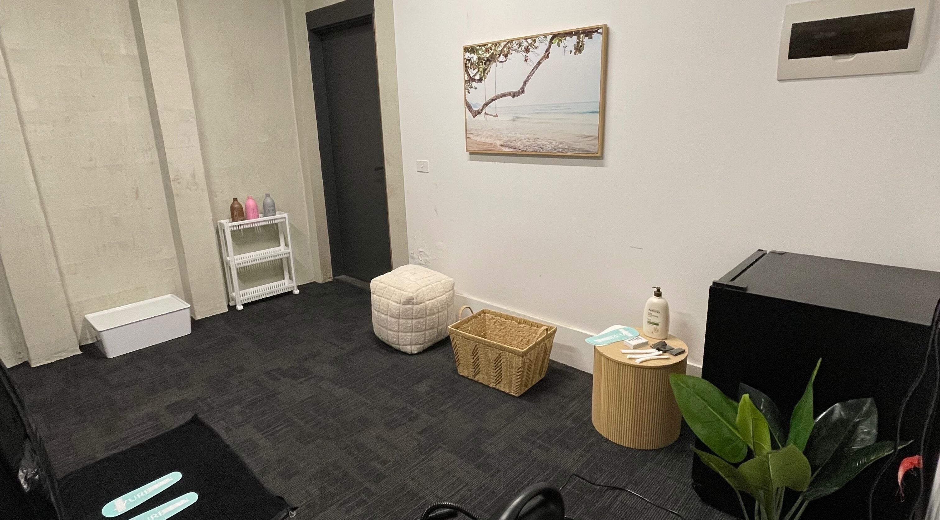 Relaxing room at The Studio, Melbourne, Victoria, AU with seating, decor, and a peaceful ambiance.