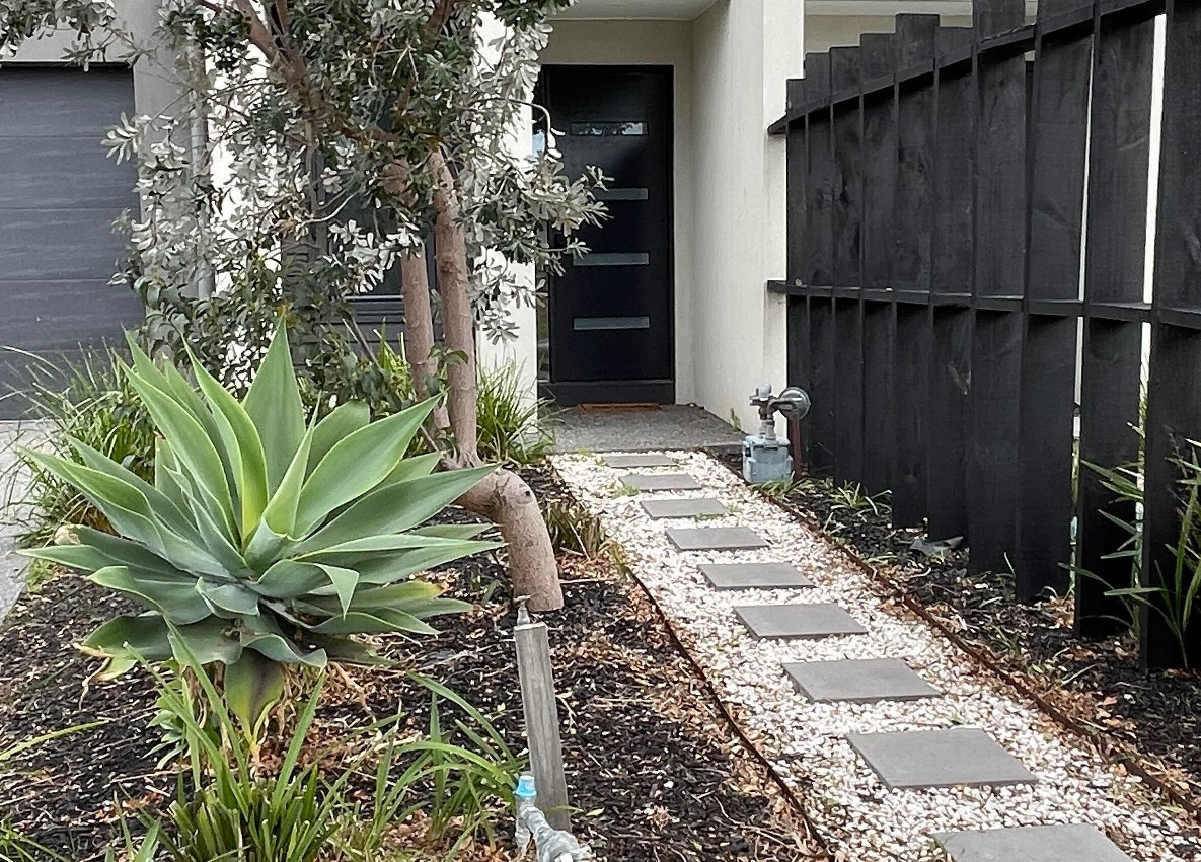 Elegant garden pathway leading to The Studio entrance in Melbourne, Victoria, AU.