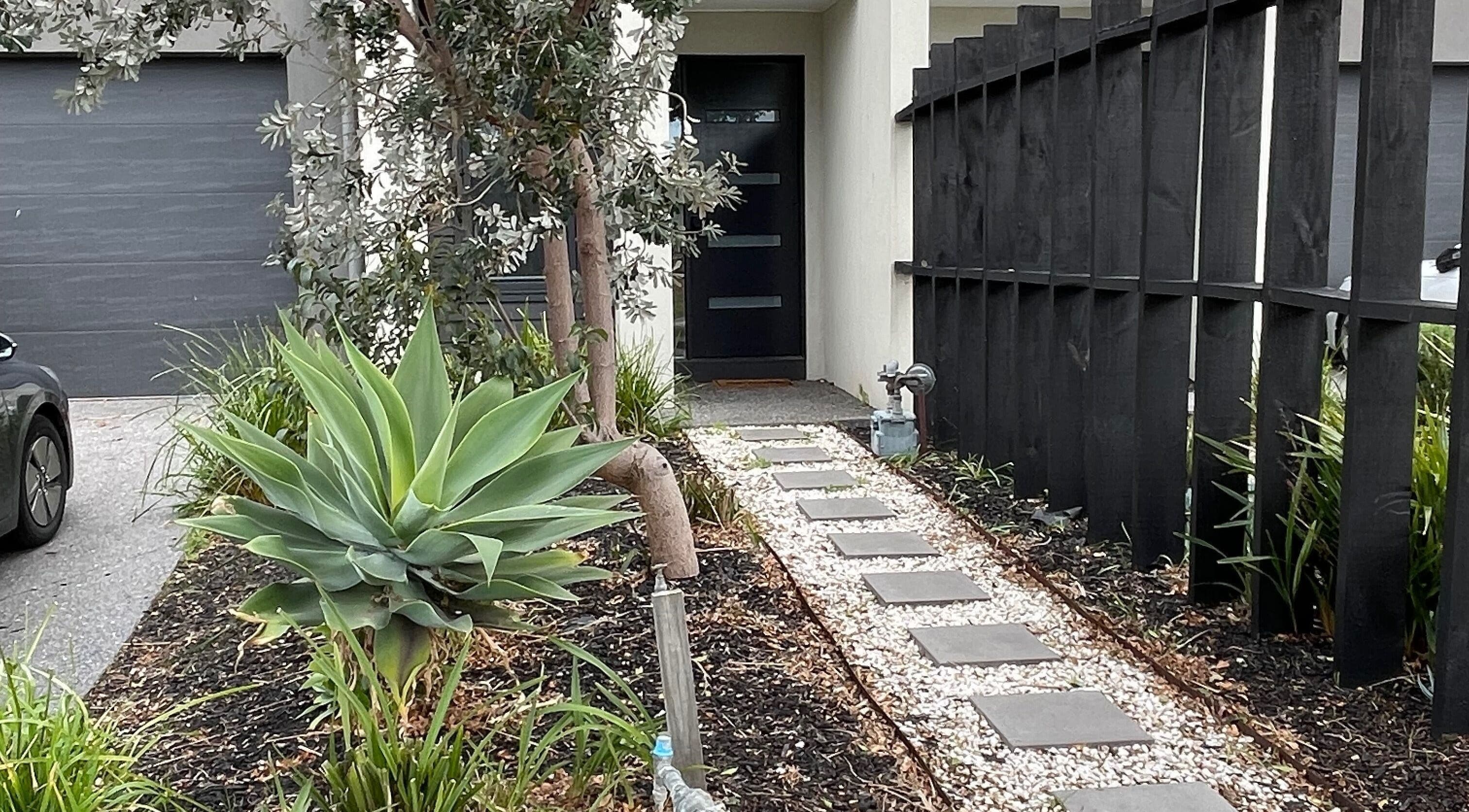 Elegant garden pathway leading to The Studio entrance in Melbourne, Victoria, AU.