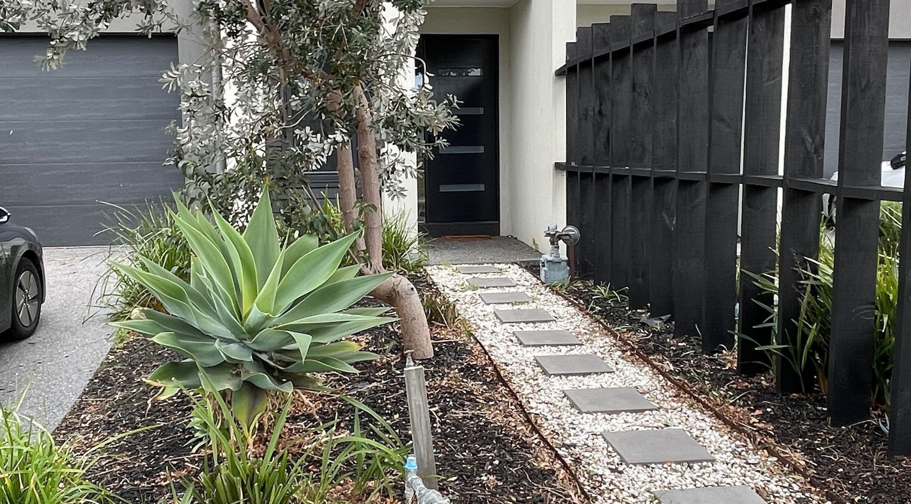 Elegant garden pathway leading to The Studio entrance in Melbourne, Victoria, AU.