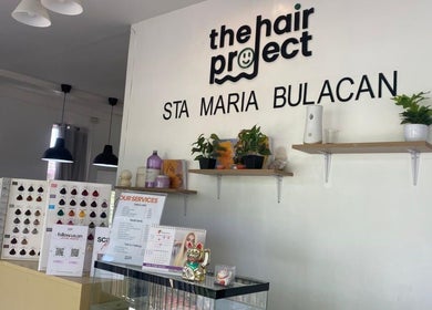 Stylish interior of Hair Project Salon in Santa Maria, Central Luzon, PH with decor and service details displayed.