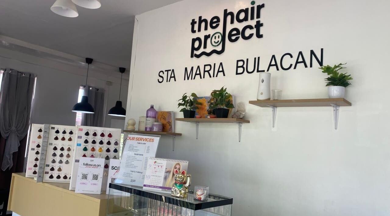 Stylish interior of Hair Project Salon in Santa Maria, Central Luzon, PH with decor and service details displayed.