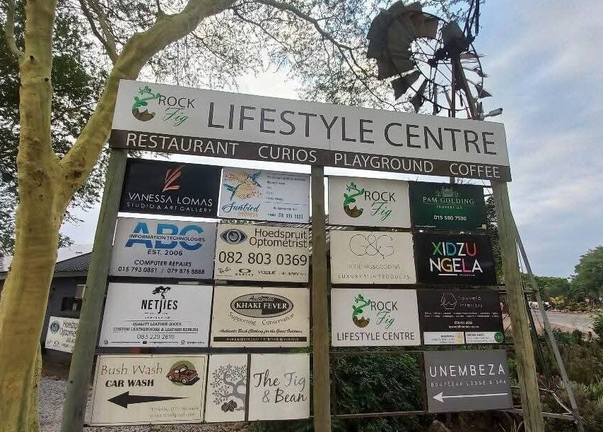 Entrance sign of Rock Fig Lifestyle Centre near Sunbird Wellness, Hoedspruit, Limpopo, ZA.