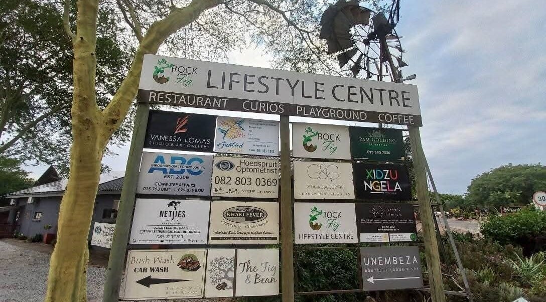 Entrance sign of Rock Fig Lifestyle Centre near Sunbird Wellness, Hoedspruit, Limpopo, ZA.