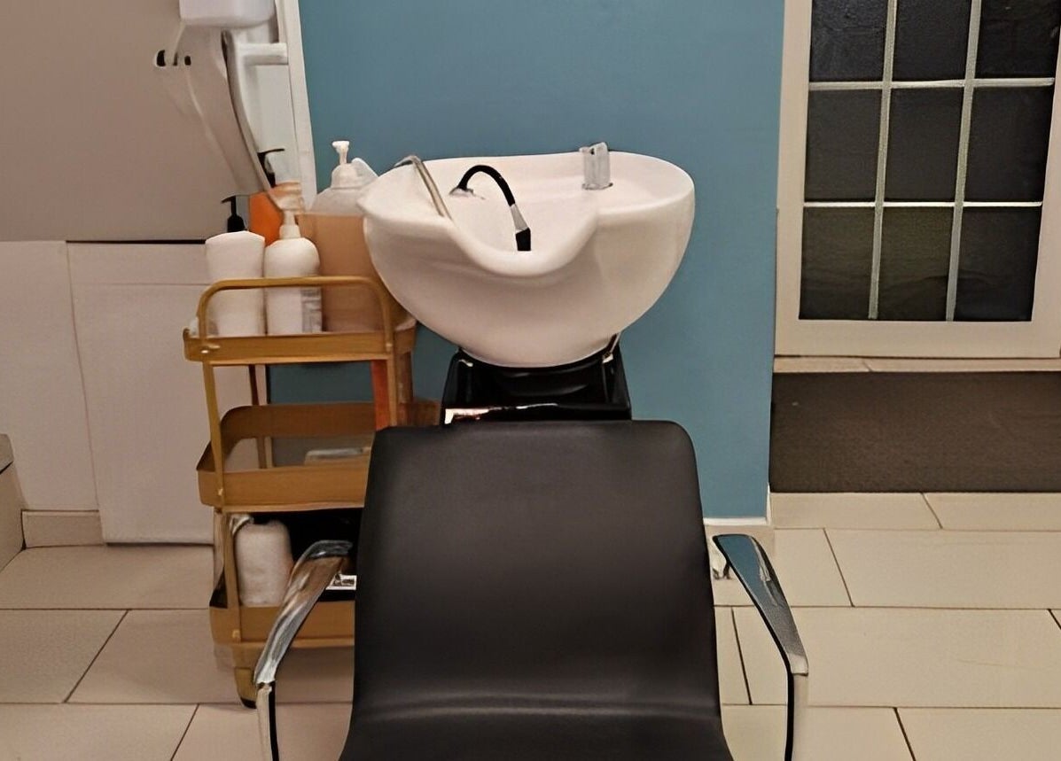 Hair washing station at A.D.A Salon Clonmel, Clonmel, County Tipperary, IE, showcasing sleek modern design.