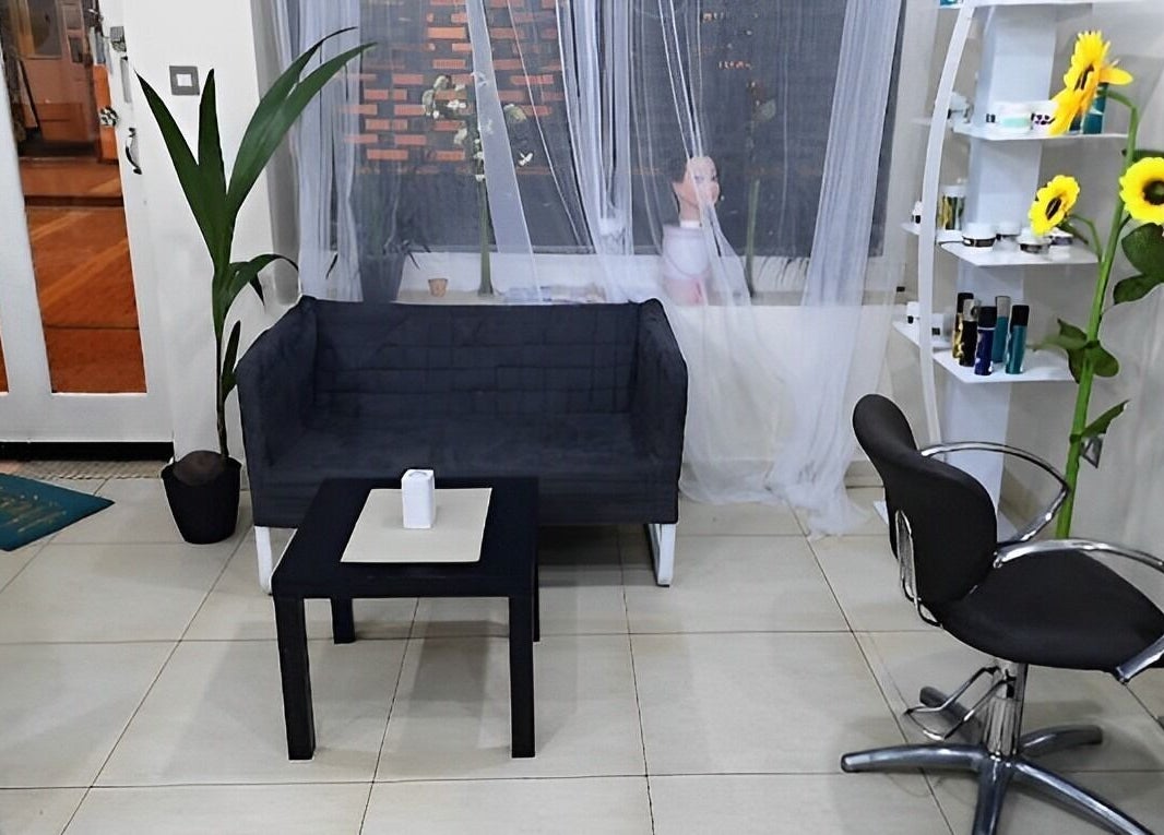 Modern waiting area at A.D.A Salon Clonmel, Clonmel, County Tipperary, IE with stylish decor and comfortable seating.