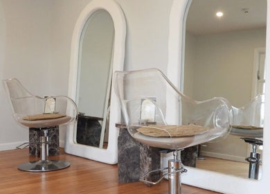 Modern salon chair with mirrors at Chere Cherie, Christchurch, Canterbury Region, NZ.