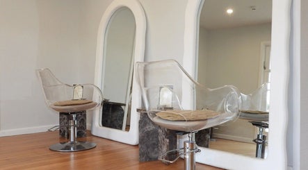 Modern salon chair with mirrors at Chere Cherie, Christchurch, Canterbury Region, NZ.