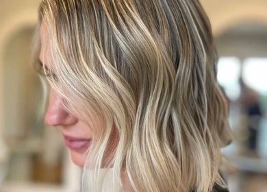 Close-up of stylish blonde waves at Chere Cherie, Christchurch, Canterbury Region, NZ.