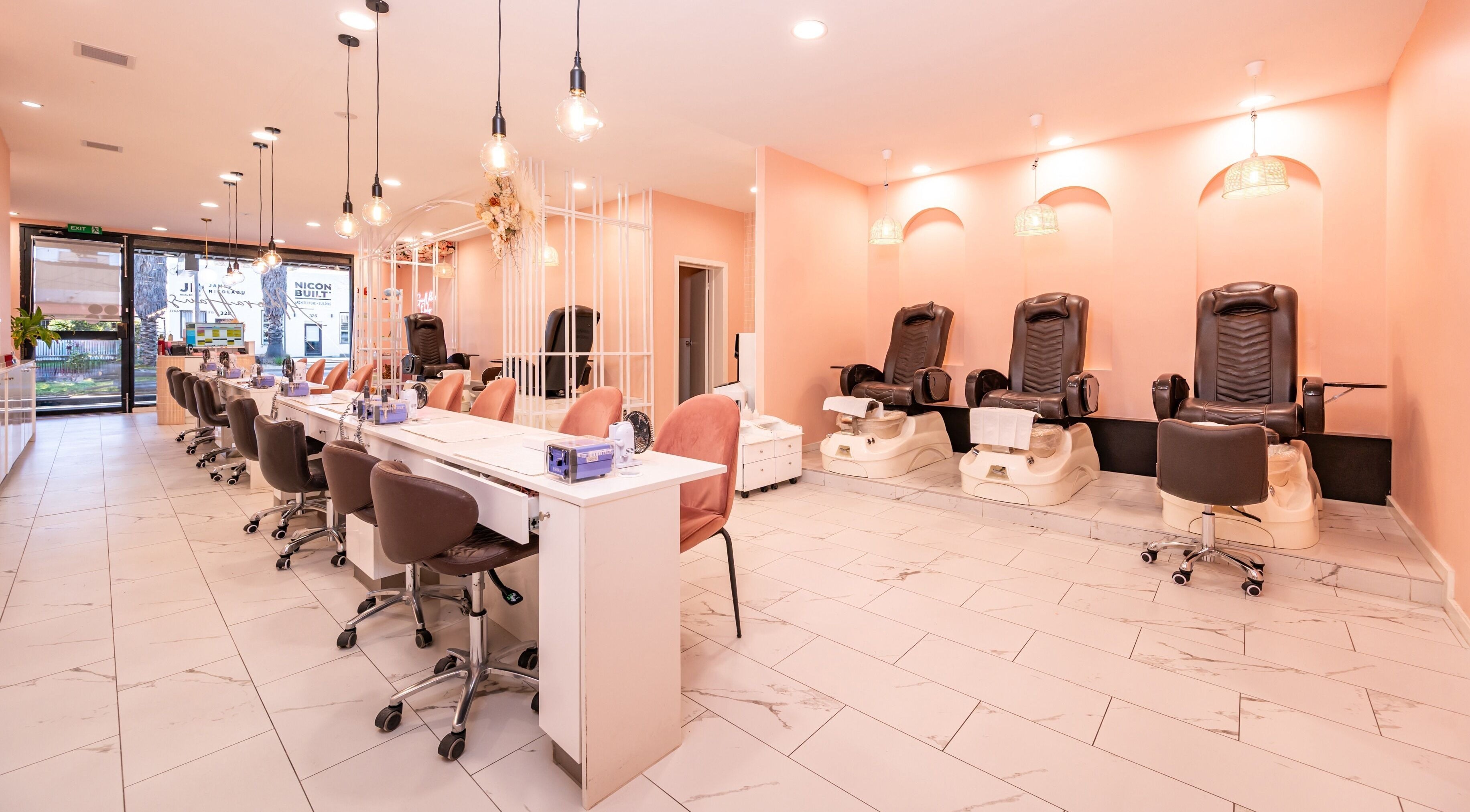 Spacious nail salon at Adora Haus, Port Melbourne, Victoria, AU with modern manicure and pedicure stations.