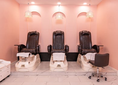 Three luxurious pedicure chairs at Adora Haus in Port Melbourne, Victoria, AU, offering a serene spa experience.
