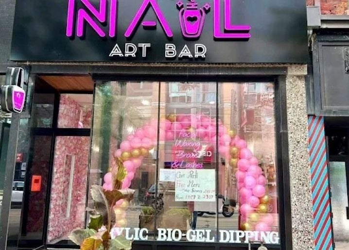 Nail Art Bar storefront with pink balloons in Toronto, Ontario, CA.