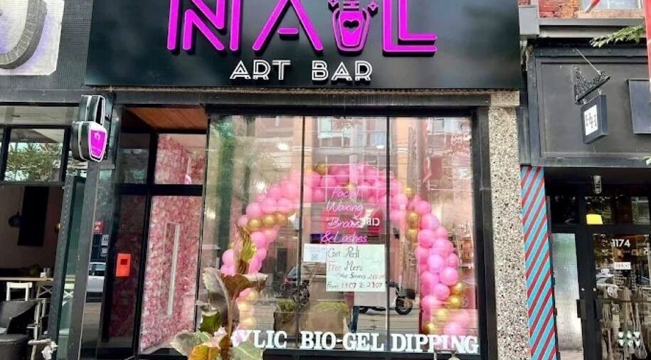 Nail Art Bar storefront with pink balloons in Toronto, Ontario, CA.