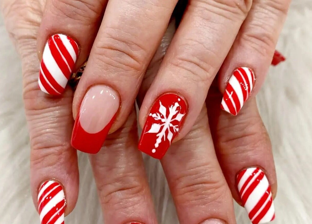 Festive red and white nail design at Nail Art Bar, Toronto, Ontario, CA.