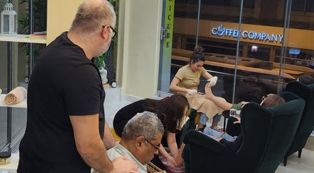 Guests enjoying foot massages at Royal Foot Massage - Taksim, İstanbul, İstanbul, TR, creating a serene atmosphere.