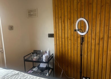 Cozy Studio No. 9 in Hucknall, England with a serene beauty setup and ambient lighting.